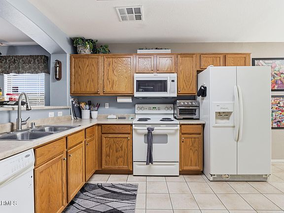 4th image of 10602 W ROANOKE Avenue