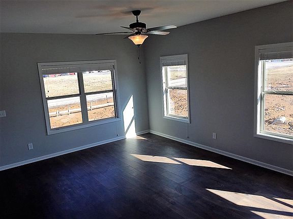 Great room with hardwood floors and lots of natural light.