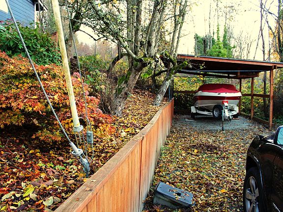 Additional parking in front and carport