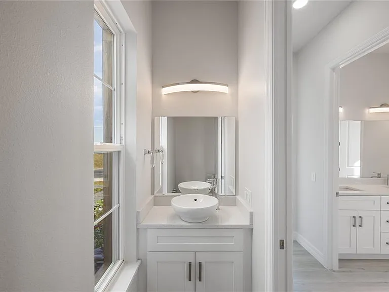 208 Snowy Orchid Way — Photo 31