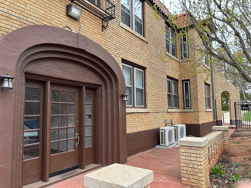 East entrance to the building with private parking
