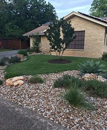 Left front of house.