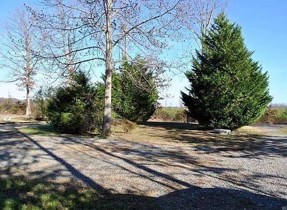 This is a view from the front door of the home.  Notice the semi-circular driveway.