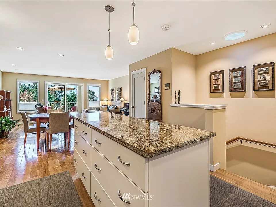 Easy, breezy entertaining!  Door to left of mirror opens to a walk-in pantry and utility closet. 