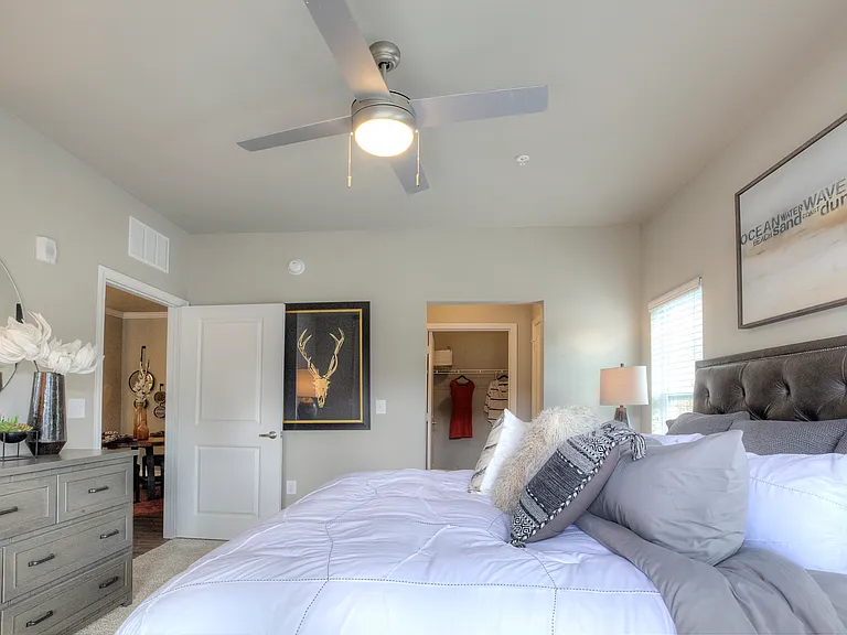 Bedroom with walk-in closet and private bath