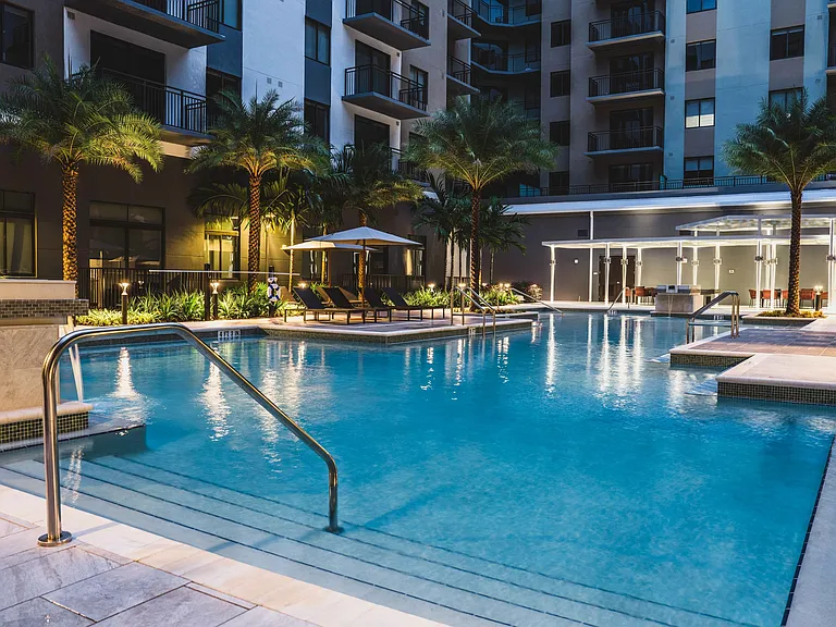 Experience the epitome of relaxation as you unwind in private comfort, shaded by chic cabanas.