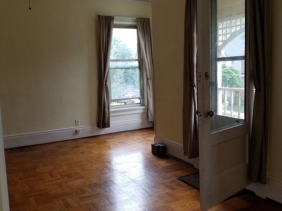 Living room-gas fireplace, door to balcony 3' x 9'