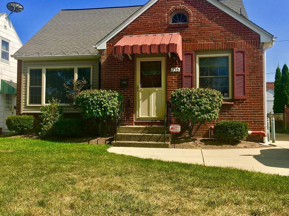 Exterior with new concrete driveway