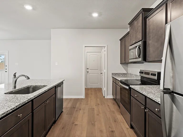 The kitchen has energy-efficient appliances.