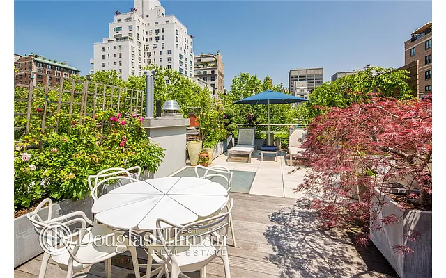 Sold by Douglas Elliman | media 52