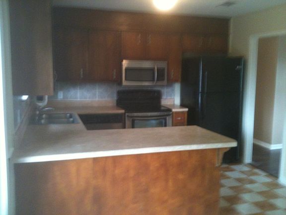 Kitchen from seating area, slider to your left
