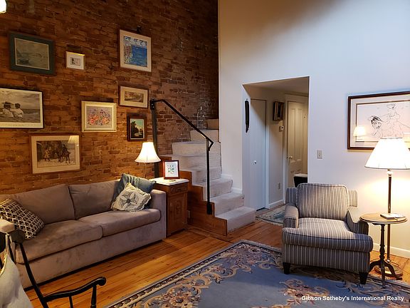 Living room stairs to bedroom loft