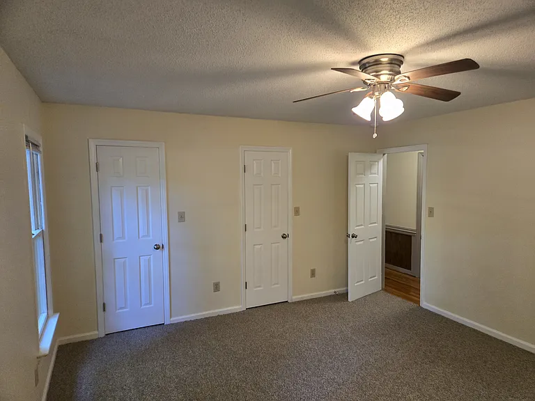 Master bedroom with his/her closets
