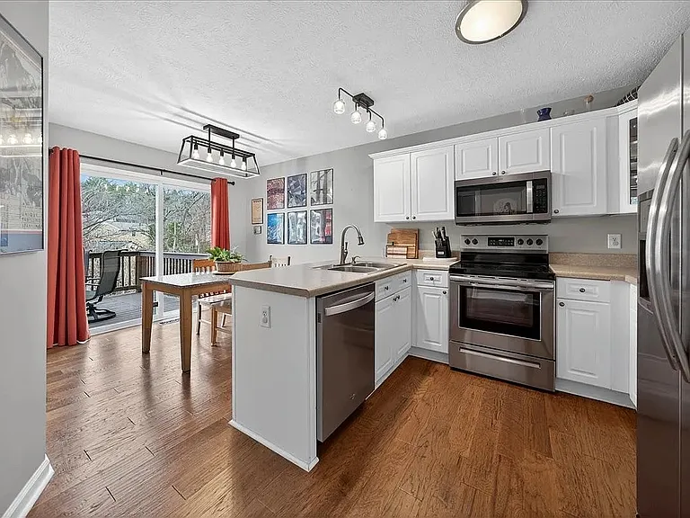 Kitchen and dining area (All appliances are included but furniture is for illustrative purposes only).