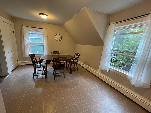Spacious eat in kitchen with large windows bringing in lots of natural lighting