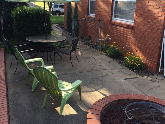 Side porch with fire pit