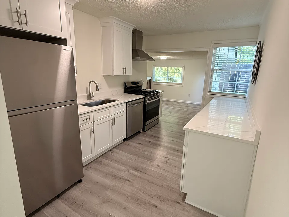 Kitchen with stainless steel appliances.
