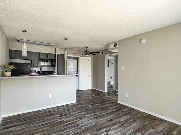 Modern kitchen featuring updated appliances, ample counter space, and sleek cabinetry.