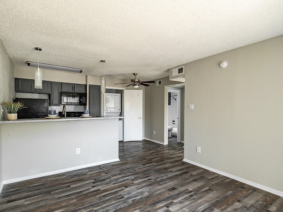 Modern kitchen featuring updated appliances, ample counter space, and sleek cabinetry.