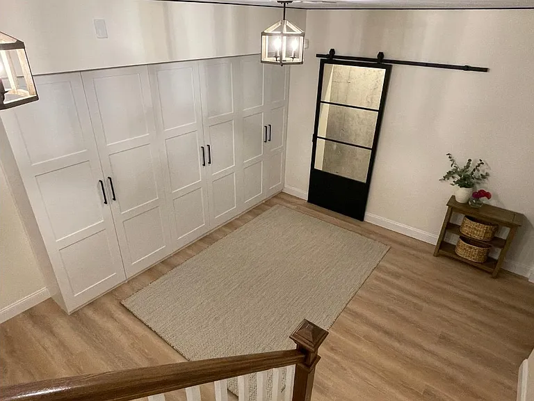 Entrance from garage with mudroom and wine storage