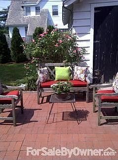 Backyard
						:
						Fenced in backyard and a brick patio. Detached garage.