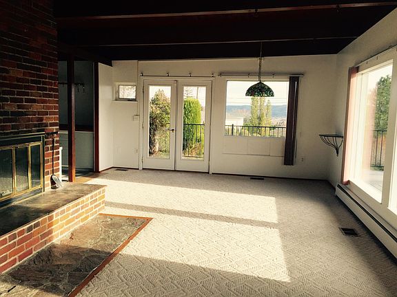 Living/Dining Room with fireplace.