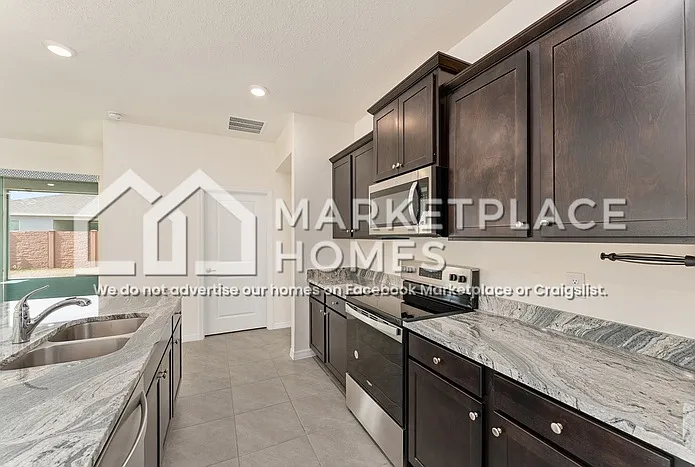 4170 NW 48th Terrace Rd — Photo 9