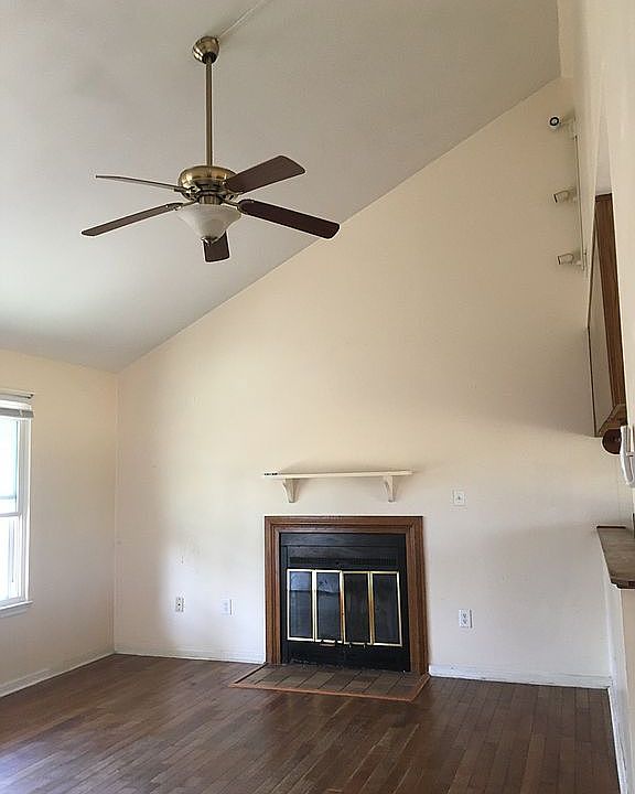 Living room with vaulted ce 