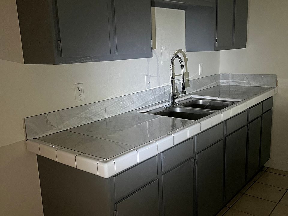 Kitchen counter tops and faucet have been remolded