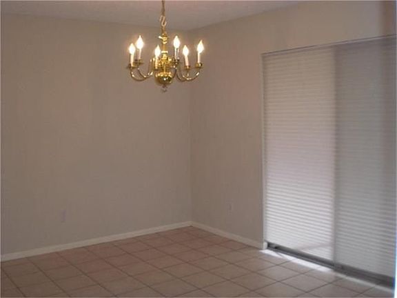 5th image of 11648 Village Place Dr #303