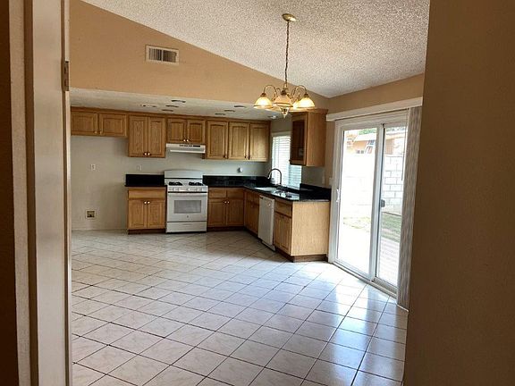 Kitchen to the left as you enter the front door
