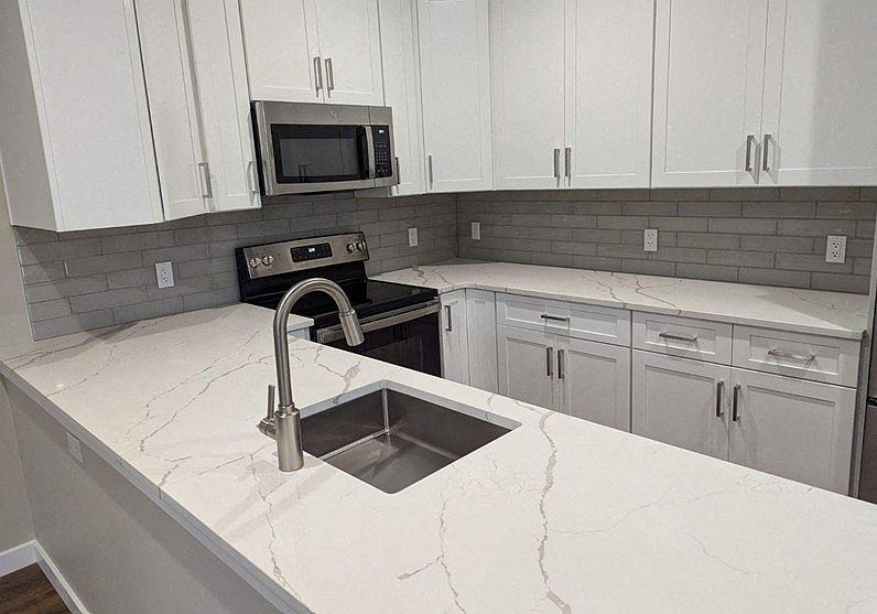 White Stone Counters Featured in Apartments #102, #104, & #106