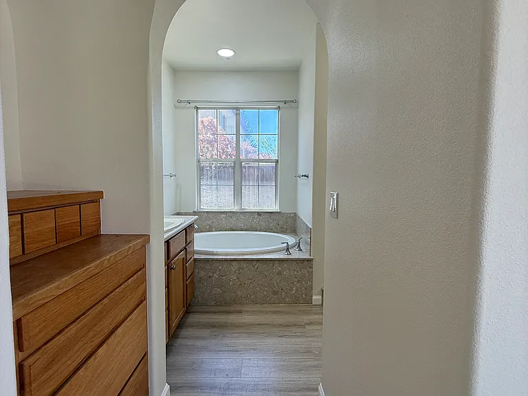master bedroom hallway to bathroom