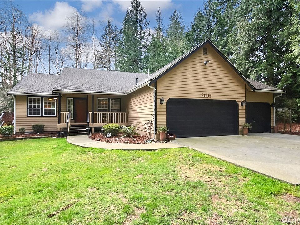 Beautiful 1 story home surrounded by 5.27 acres of tree filled private property including a large pond for your enjoyment.Belongs to West Tapps Homeowners Assoc. For $30 a month you get access to 3 different parks that include a boat launch, swimming area, tennis courts, playgrounds, picnic areas & more!