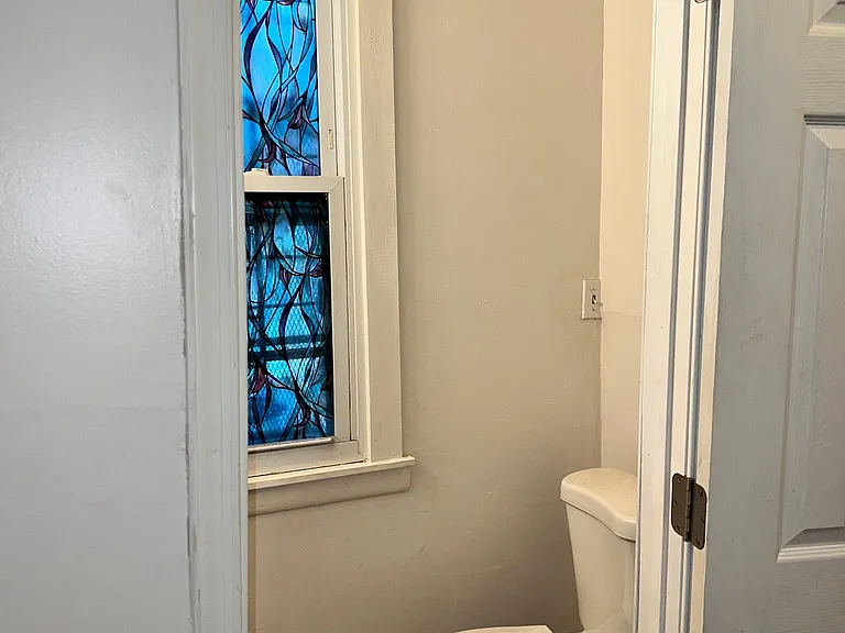 Pass the kitchen is the dining room and the half bath