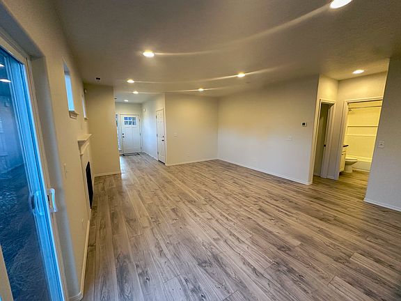 Reverse view from kitchen facing front door.