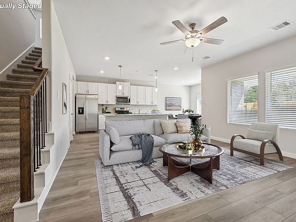 The living room of a home in Stewart s Ranch in Conroe, TX.