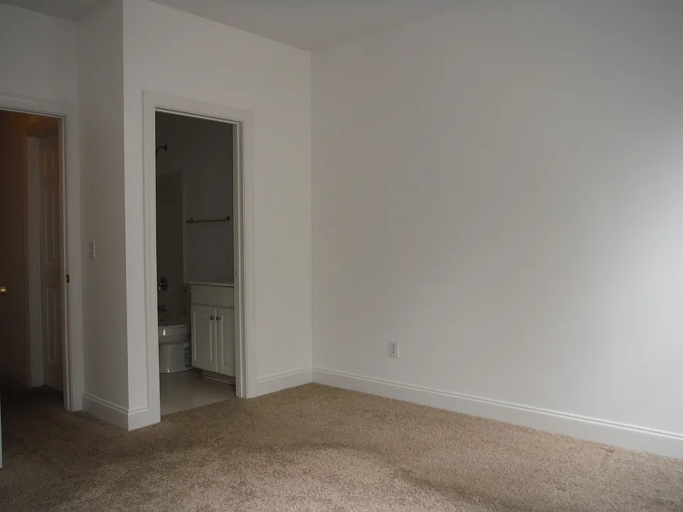 Bedroom with shared full bath