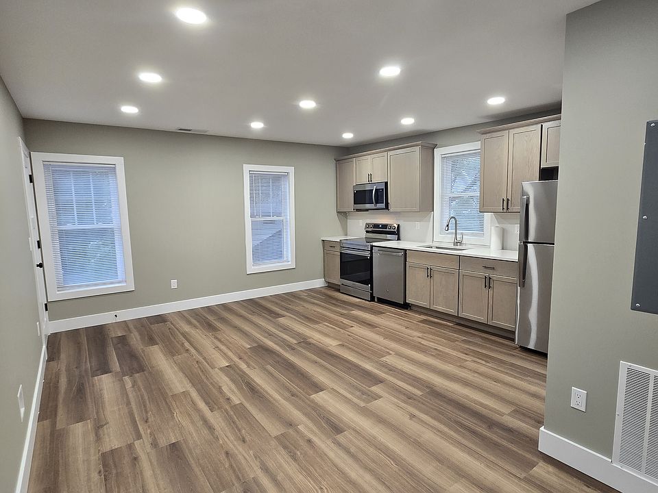 Another view of the living room kitchen open space. Lots for room here for a couch and a small eating area