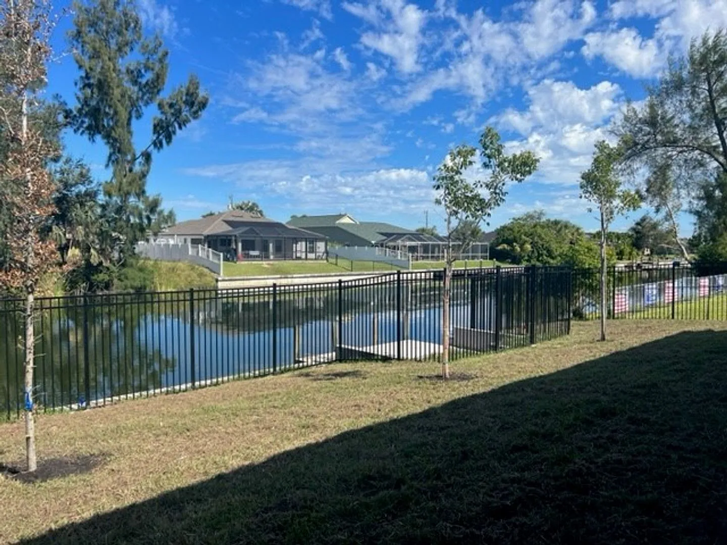 Brand-New Canal Front Home with Private Dock, 3-Car Garage & Modern Upgrades in Cape Coral — Photo 2