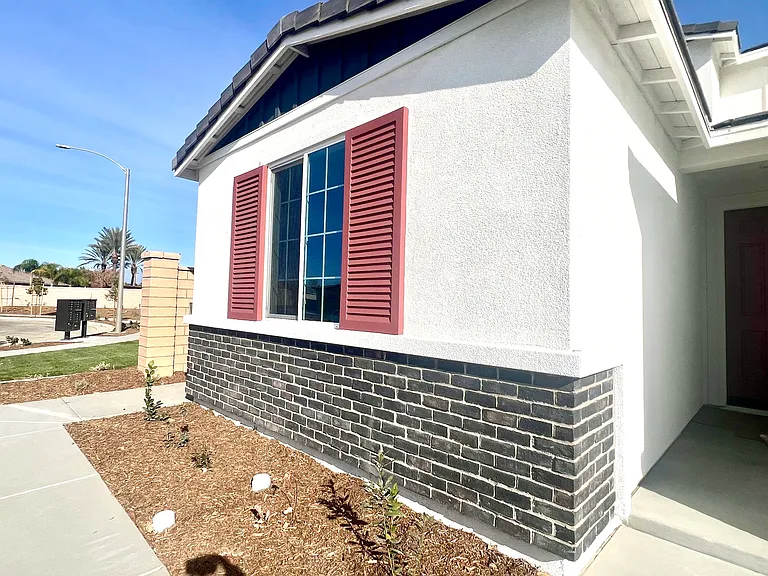 The front entrance and side entrance are to the in-law suite.