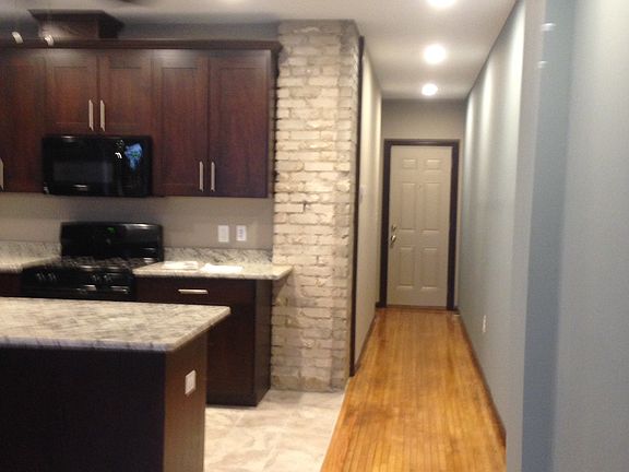 Exposed brick chimney in kit