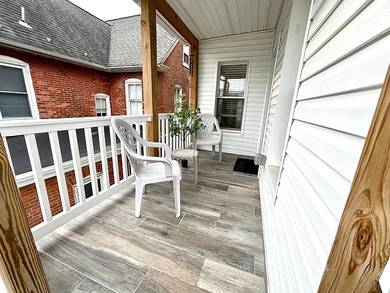 Deck that accesses the living room from the backyard