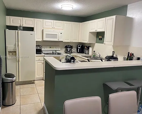 6995 NW 173rd Dr #2105 Photo 1