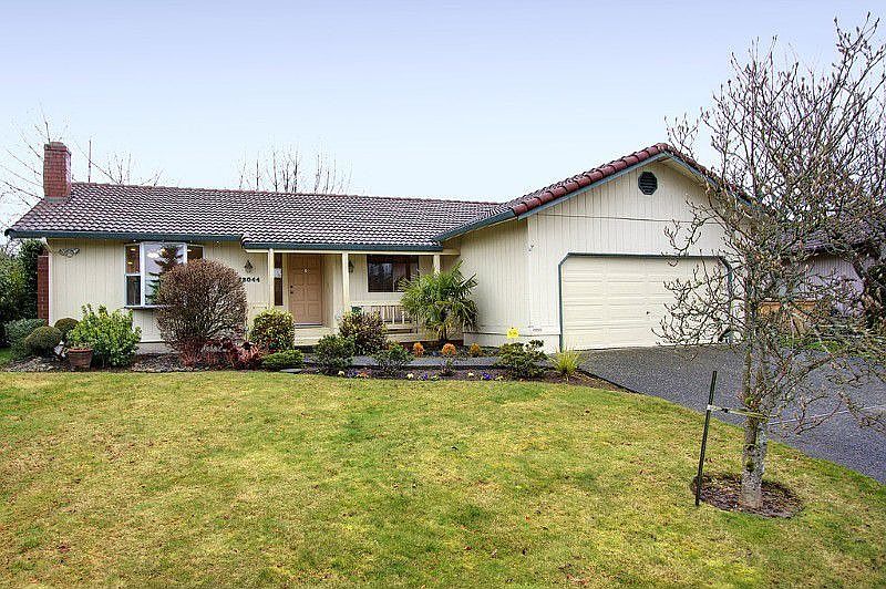 Durable tile roofs are commonly seen in this quiet and friendly neighborhood. There's an additional parking pad to the right of the driveway, not seen in photo, which provides for small/modest-sized Boat/RV parking.