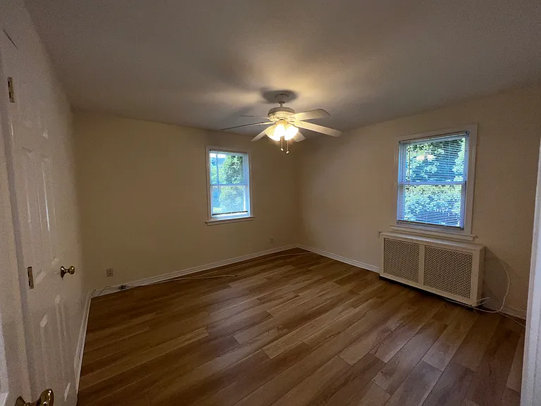 Master Bedroom with ample closet space - left side passed entry door - Ceiling Fan and smoke detector .