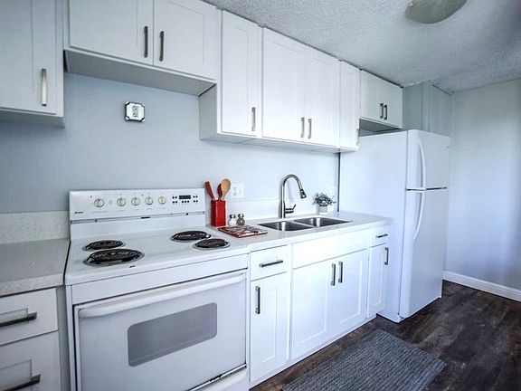Brand new kitchen cabinents, quartz countertop and full size refrigerator.