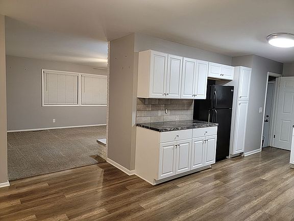 Kitchen w/ living room view