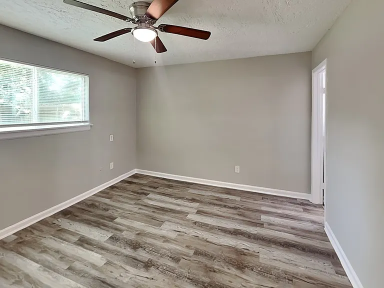 Spacious room with neutral gra