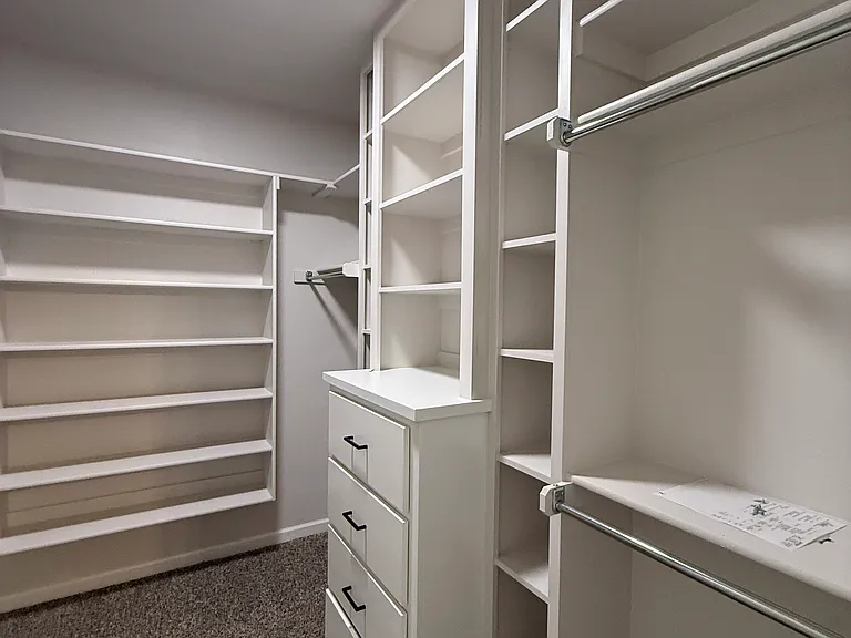 Primary Bedroom Walk in Closet